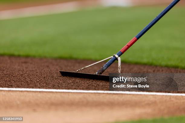 Grounds crew rakes the infield prior to the game between the Cincinnati Reds and the Philadelphia Phillies at Citizens Bank Park on Friday, April 7,...