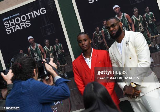 Producer/basketball player LeBron James and player Marquis "Mookie" Cook attend the Los Angeles premiere of "Shooting Stars" at the Regency Village...