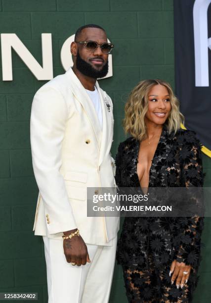 Producer/basketball player LeBron James and his wife Savannah James attend the Los Angeles premiere of "Shooting Stars" at the Regency Village...