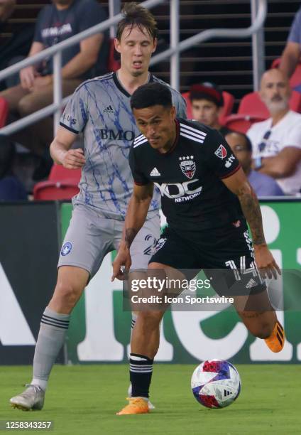 United midfielder Andy Najar moves away from CF Montréal midfielder Lassi Lappalainen during a MLS game between DC United and CF Montreal, on May 31...