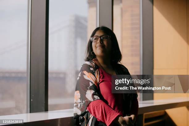 Devine Cruz, a patient who suffered from psychotic episodes and showed symptoms of schizophrenia, stands for a portrait at the NYS Psychiatric...