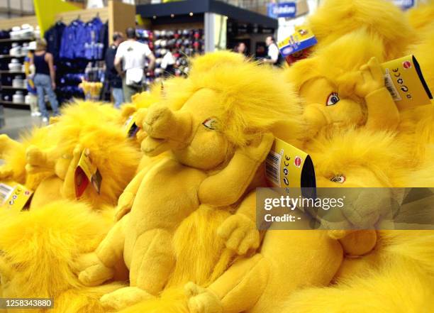 Scores of copies of Millie, the 2000 Olympic mascot, lay on display in a store 14 September, 2000 on the eve of the Millennium Games. Millie is based...