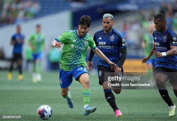 San Jose Earthquakes forward Tommy Thompson defends against Seattle Sounders midfielder Dylan Teves during a MLS matchup between the San Jose...