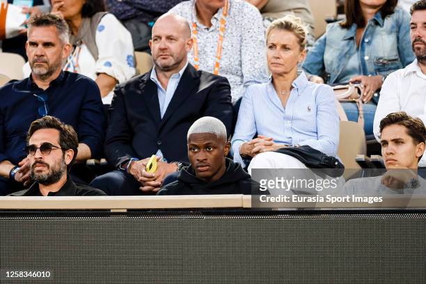 Nuno Mendes of Paris Saint Germain watching the match between Novak Djokovic of Serbia and Marton Fucsovics of Hungary during their Singles First...