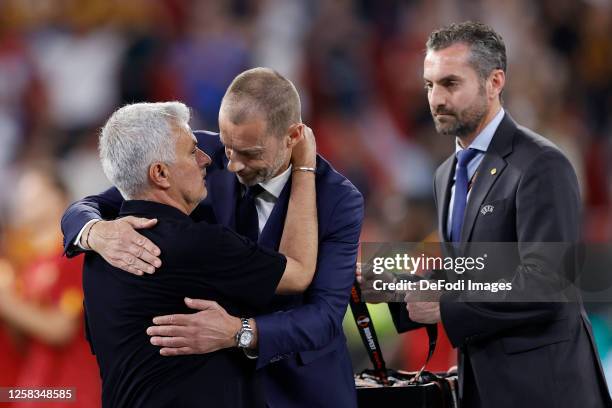 President Aleksander Ceferin greets Jose Mourinho Head Coach of AS Roma during the award ceremony after the UEFA Europa League 2022/23 final match...