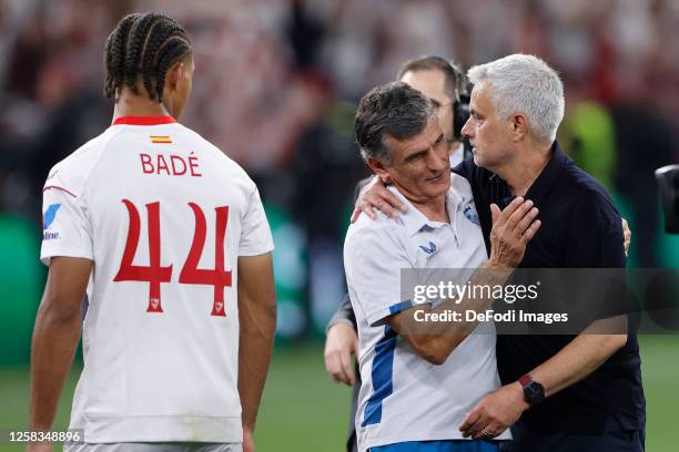 Jose Mourinho Head Coach of AS Roma greets Jose Luis Mendilibar head coach of Sevilla FC during the award ceremony after the UEFA Europa League...