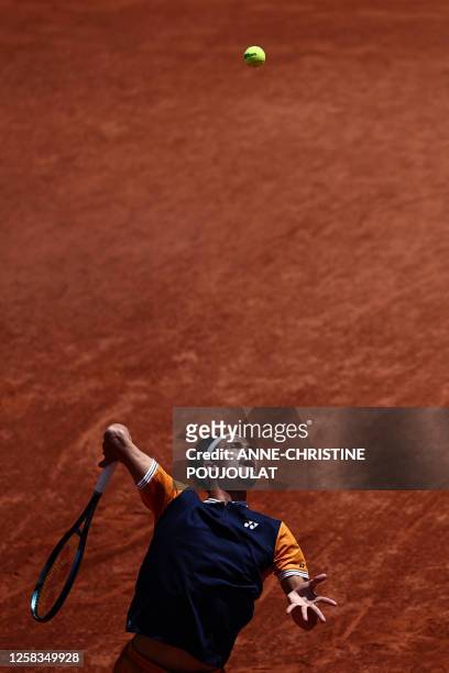 Germany's Daniel Altmaier serves to Italy's Jannik Sinner during their men's singles match on day five of the Roland-Garros Open tennis tournament at...