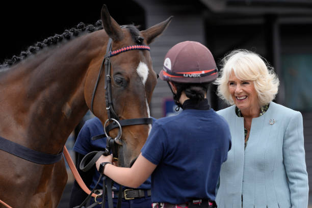 GBR: Queen Camilla Visits The British Racing School