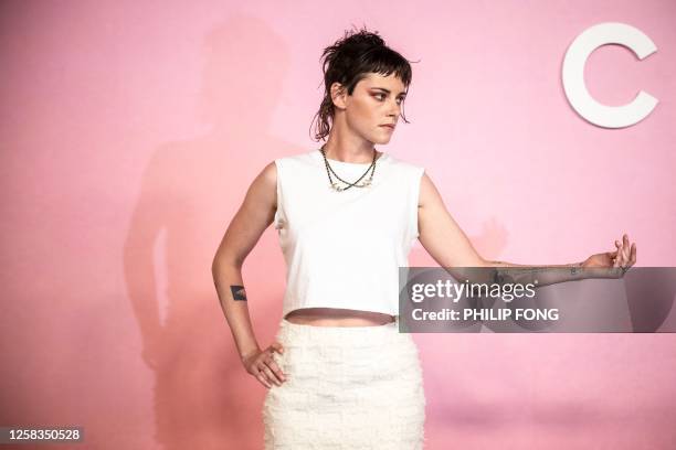 Actress Kristen Stewart poses for a photo before attending the 2022/23 Métiers d'art Chanel Dakar Show in Tokyo on June 1, 2023.