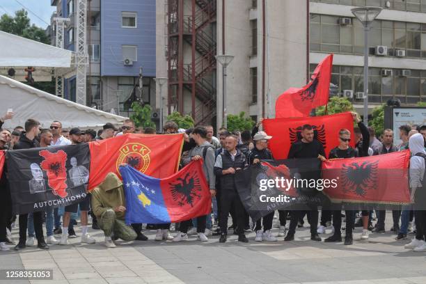 Kosovo Albanians hold Albanian flags take part in a demonstration in the south of Mitrovica on June 1, 2023. Several hundred people rallied in the...