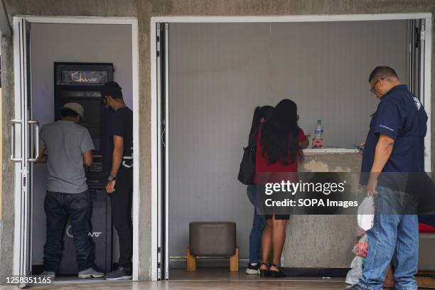 People use a Chivo Bitcoin ATM in San Salvador. The Bukele administration has ended its fourth year in office ahead of a questioned re-election bid....