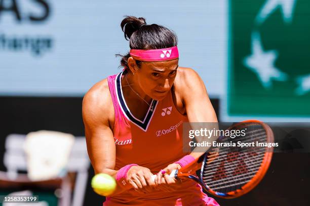 Carolina Garcia of France plays a backhand against Anna Blinkova during their Singles First Round Match on Day Four of the 2023 French Open at Roland...