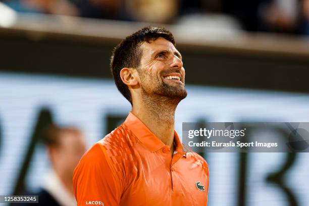Novak Djokovic of Serbia celebrates after winning Marton Fucsovics of Hungary during their Singles First Round Match on Day Four of the 2023 French...