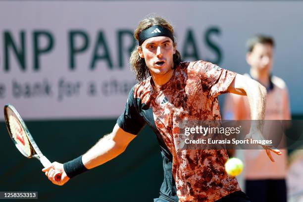 Stefanos Tisitsipas of Greece plays a forehand against Robert Carballes of Spain during their Singles First Round Match on Day Four of the 2023...