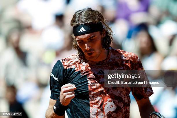 Stefanos Tisitsipas of Greece celebrates a set won against Robert Carballes of Spain during their Singles First Round Match on Day Four of the 2023...