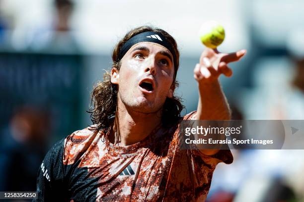 Stefanos Tisitsipas of Greece serves the ball against Robert Carballes of Spain during their Singles First Round Match on Day Four of the 2023 French...