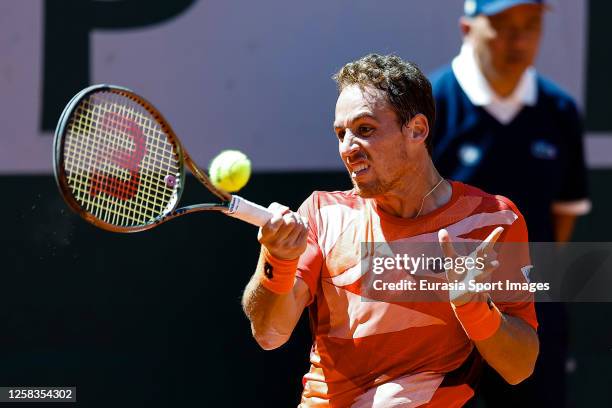 Robert Carballes of Spain plays a forehand against Stefanos Tisitsipas of Greece during their Singles First Round Match on Day Four of the 2023...