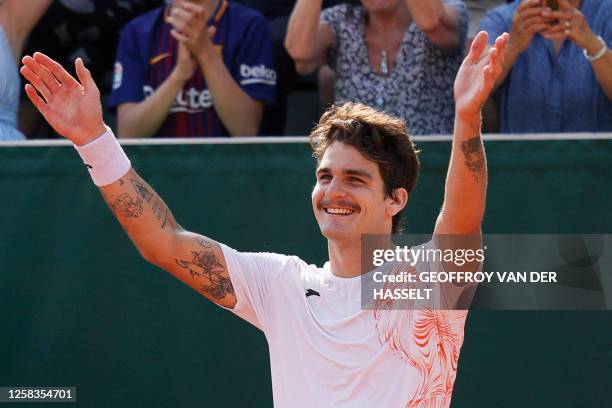 Brazil's Thiago Seyboth Wild celebrates after winning against Argentina's Guido Pella during their men's singles match on day five of the...