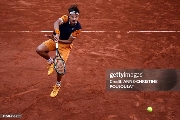 Germany's Daniel Altmaier returns the ball to Italy's Jannik Sinner during their men's singles match on day five of the Roland-Garros Open tennis...