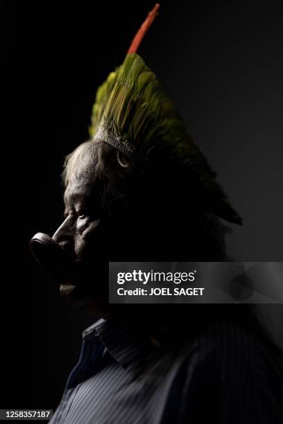 Indigenous leader Cacique Raoni Metuktire of the Kayapo tribe poses during a photo session in Paris, on June 1, 2023.