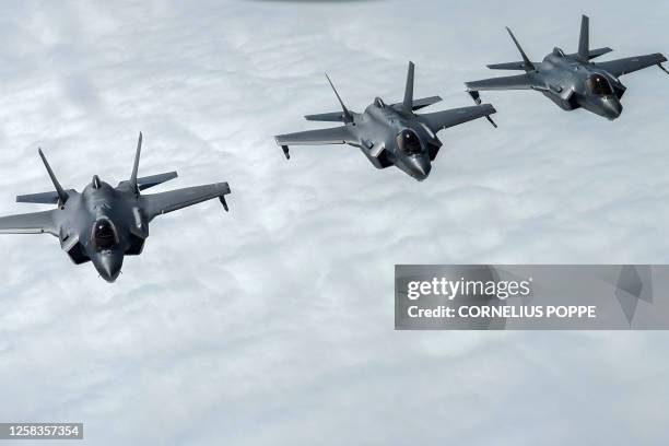 Norwegian F-35 Lightning fighter jets fly during the Arctic Challenge Exercise near Orland Main Air station, Norway on June 1, 2023. Aircraft from...