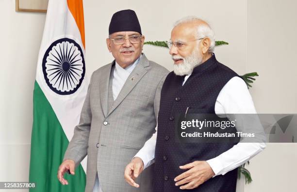 Prime Minister Narendra Modi with Prime Minister of Nepal Pushpa Kamal Dahal 'Prachanda' arrive for their meeting, at the Hyderabad House, on June 1,...