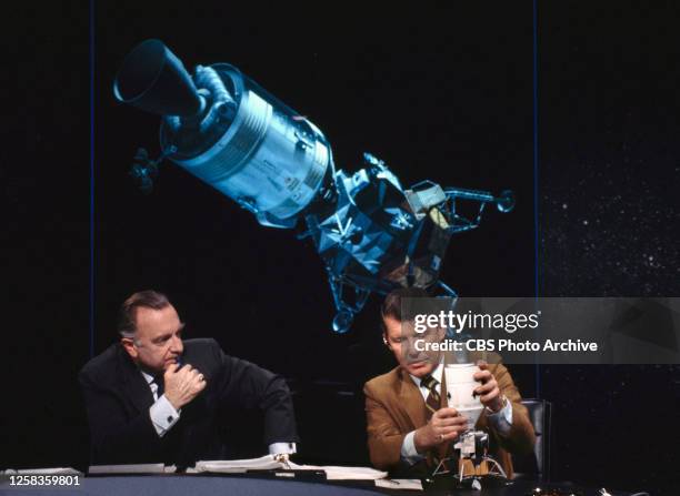 From left is CBS News reporter Walter Cronkite and NASA astronaut Wally Schirra, consultant and co-anchor on the broadcast. Grumman Aerospace at...