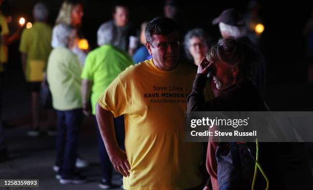 Bob Carter, mayor of Minden Hills talks to his wife, a doctor at the Minden Hospital Supporters of the Minden emergency department gathered for a...