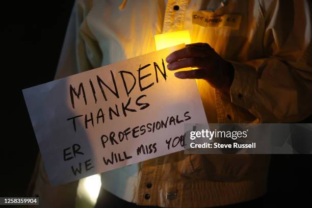 Supporters of the Minden emergency department gathered for a candlelight vigil to honour the staff on their last shift as the emergency closes...