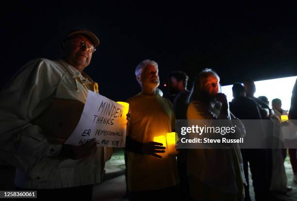 Supporters of the Minden emergency department gathered for a candlelight vigil to honour the staff on their last shift as the emergency closes...