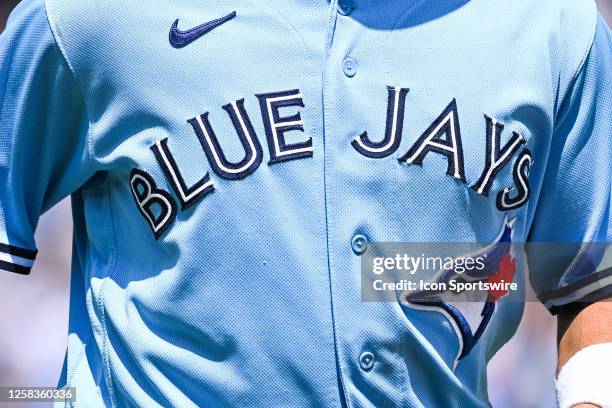 View of a Toronto Blue Jays logo on a jersey worn by a member of the team during the Milwaukee Brewers versus the Toronto Blue Jays game on June 01...