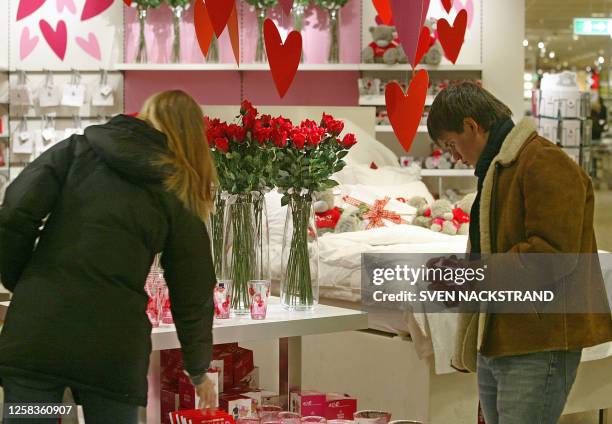 People look for Valentine gifts at a Stockholm department store 11 February 2004, in preparation for St Valentine's Day on 14 February. Valentine's...