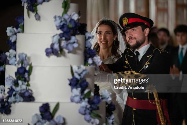 King Abdullah II of Jordan and Queen Ranya give a reception at the Huseyniye Palace in Amman, Jordan for the wedding of Crown Prince Hussein on June...