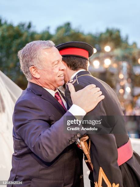 King Abdullah II of Jordan and Queen Ranya give a reception at the Huseyniye Palace in Amman, Jordan for the wedding of Crown Prince Hussein on June...
