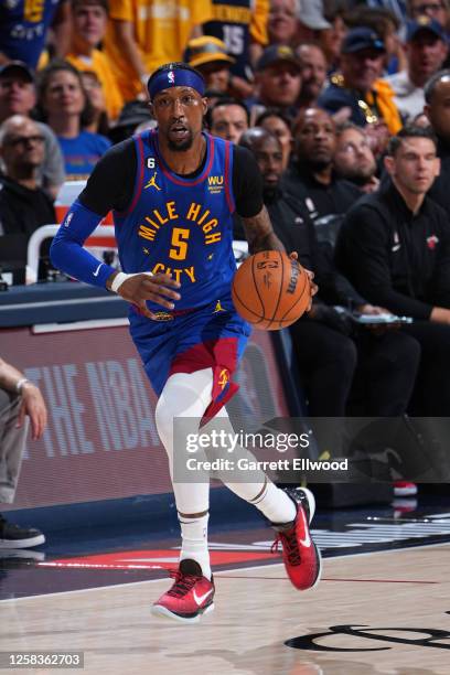 Kentavious Caldwell-Pope of the Denver Nuggets dribbles the ball against the Miami Heat during Game One of the 2023 NBA Finals on June 1, 2023 at the...