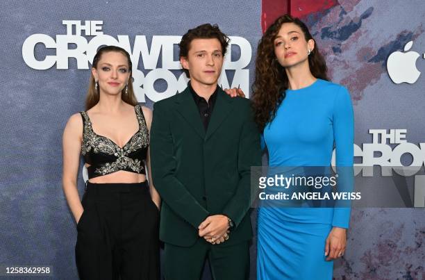 Actors Amanda Seyfried , Tom Holland and Emmy Rossum arrive for the premiere of Apple TV+'s "The Crowded Room" at the Museum of Modern Art in New...