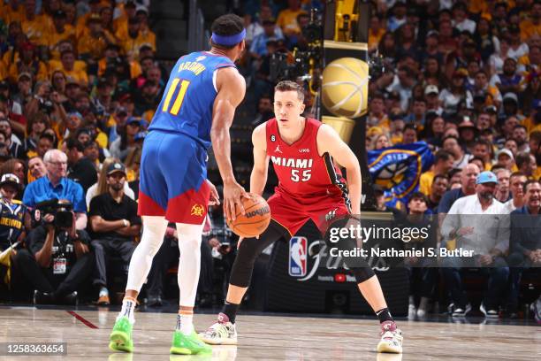 Duncan Robinson of the Miami Heat plays defense during Game One of the 2023 NBA Finals against Bruce Brown of the Denver Nuggets on June 1, 2023 at...