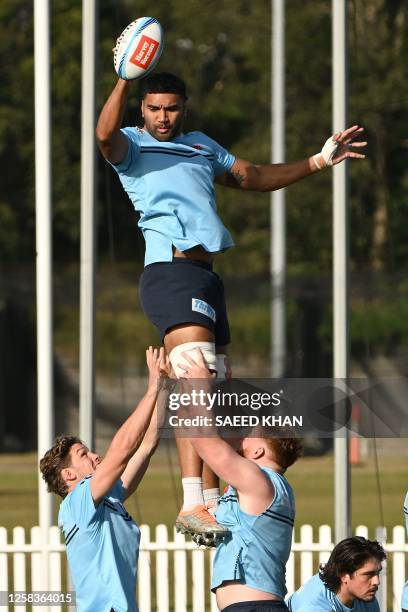 Waratahs' Michael Hooper takes part in a training session during a Waratahs' Super Rugby media opportunity at the NSW Rugby Union Centre in Sydney on...