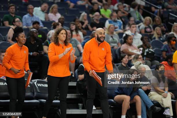 Connecticut Sun coaching staff celebrates a play during the game against the Minnesota Lynx on June 1, 2023 at Target Center in Minneapolis,...