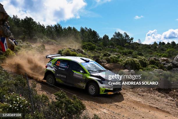 Sweden's Oliver Solberg and co-driver Britain's Elliott Edmondson steer their Skoda Fabia RS near Olbia on June 2, 2023 as part of the SS2 section of...