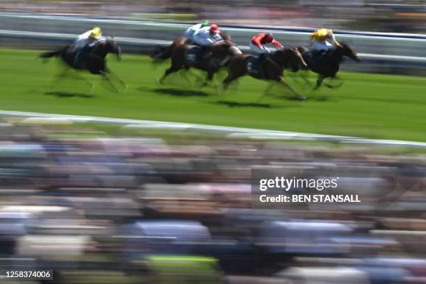 Jockey Charles Bishop rides Bobsleigh to victory in the Woodcote Stakes on the first day of the Epsom Derby Festival horse racing event in Surrey,...