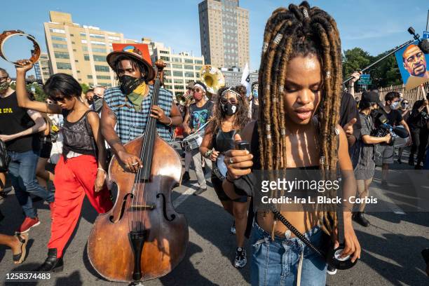 July 25: Livia Rose Johnson an organization leader of Warriors In the Garden takes a moment as she helps lead the protesters in chants as she is...