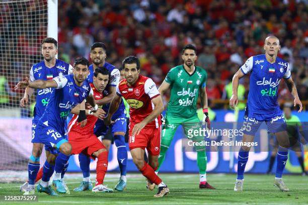Peyman Babaei of Esteghlal FC and Vahid Amiri of Persepolis look on during the Hazfi Cup match between Persepolis FC and Esteghlal FC on May 31, 2023...