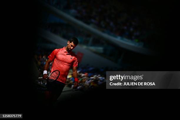 Serbia's Novak Djokovic reacts during his match against Spain's Alejandro Davidovich Fokina during their men's singles match on day six of the...