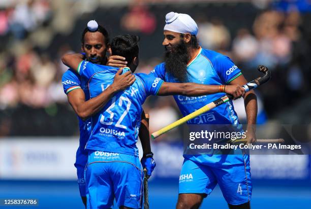 India's Prasad Vivek Sager celebrates scoring the opening goal with his team mates during the FIH Hockey Pro League match at Lee Valley, London....