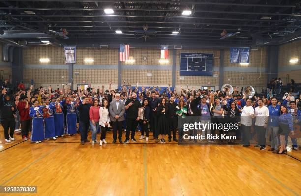 El Fantasma and Francisco "Paco" Fuentes pose with students and faculty at the Latin GRAMMY In The Schools educational program at Sidney Lanier High...