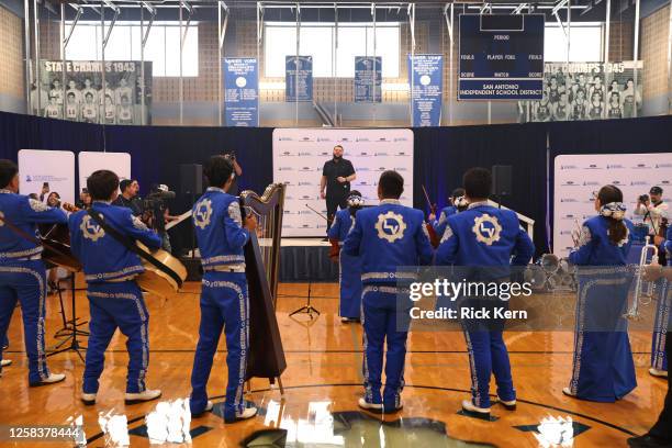 El Fantasma performs with the Sidney Lanier High School band at the Latin GRAMMY In The Schools educational program at Sidney Lanier High School on...