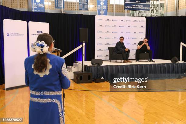 Francisco "Paco" Fuentes and El Fantasma answer student's questions at the Latin GRAMMY In The Schools educational program at Sidney Lanier High...