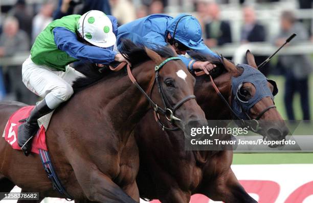 Italian Jockey Frankie Dettori riding Ekraar winning the Troy Stakes at Doncaster, 14th September 2001. Placed second Irish Jockey Jimmy Fortune...