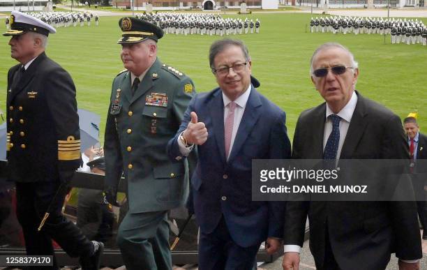 Colombian President Gustavo Petro , accompanied by Colombian Minister of Defense Ivan Velasquez and members of the military high command, gives a...